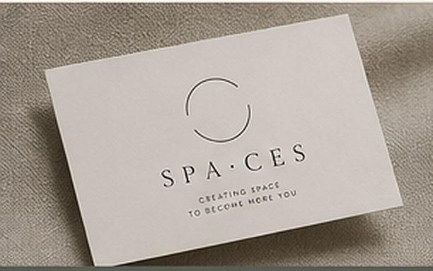SPA·CES business cards on linen